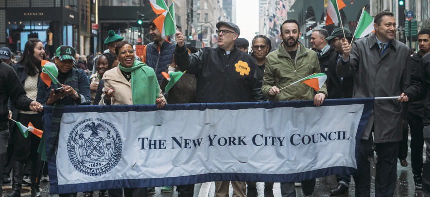 The New York City Council walking in the St. Patrick's Day parade on March 17.